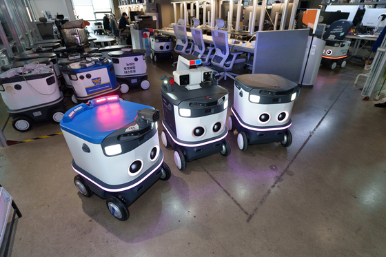 Three different Neubility's Neubie robots are parked at the company's headquarters in Seongdong District, eastern Seoul [CHO YONG-JUN]
