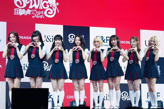 Members of UNIS pose for photos during a showcase held on April 15 at Yes24 Live Hall in eastern Seoul ahead of the release of its second EP "Swicy.” [DANIELA GONZALEZ PEREZ]