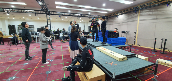 Mofac Studios developed a virtual production platform to produce ″The King of Kings,″ the process of which is shown here. Using motion-capture technology, the film was shot in live action. [MOFAC STUDIOS]