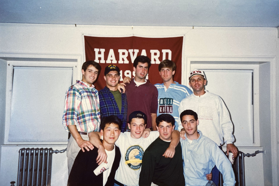 James Rhee is pictured with Harvard friends, including actor Matt Damon, second from the left in the front row. James Rhee was often the only Asian person at social gatherings. [JAMES RHEE]