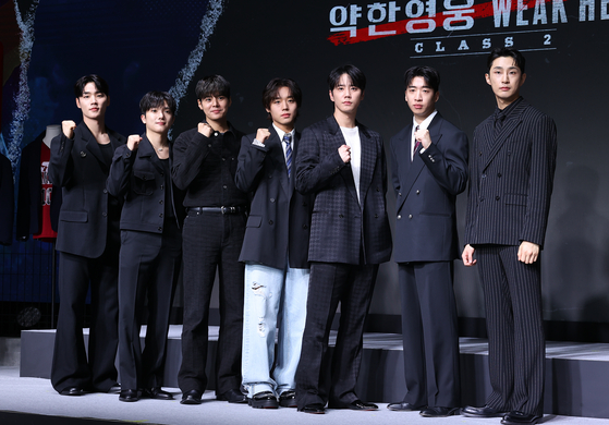 The cast of Netflix action school series ″Weak Hero Class 2″ poses for photos during the series' press conference held in Mapo District, western Seoul, on April 21. From left are actors Lee Min-jae, Choi Min-yeong, Ryeo Un, Park Ji-hoon, Lee Jun-young, Yu Su-bin and Bae Na-ra. [YONHAP]