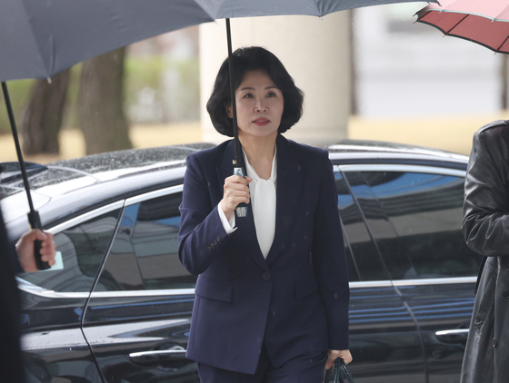 Kim Hye-kyung arrives at the Suwon High Court in Suwon, Gyeonggi, on April 14 for an appellate trial. [NEWS1]