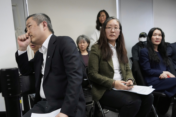 Peter Moller, left, Han Boon-young, co-founders of the Danish Korea Rights Group, and adoptee Kim Yoo-ree, right, attend a press conference at the Truth and Reconciliation Commission in central Seoul on March 26. [AP/YONHAP]