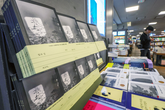 Han Kang's books including ″Light and Thread″ are displayed at Kyobo Book's Gwanghwamun branch in Jongno District, central Seoul, on April 24. [NEWS1] 