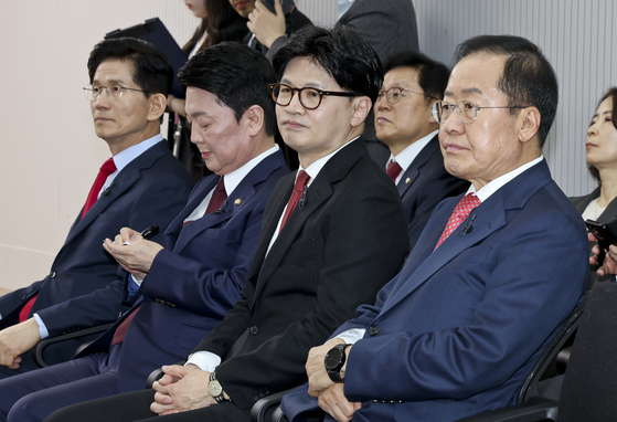 People Power Party (PPP) presidential primary candidates, from left, Kim Moon-soo, Ahn Cheol-soo, Han Dong-hoon and Hong Joon-pyo, attend a media day event at the PPP campaign office at the National Assembly in Yeouido, western Seoul, on April 23. [YONHAP]