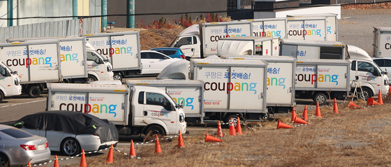Delivery trucks of e-commerce giant Coupang are pictured in this file photo taken Feb. 26. [YONHAP]