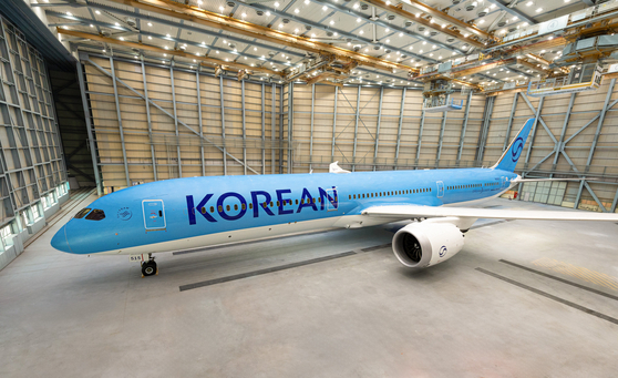 A Korean Air aircraft with a new logo and livery at a hanger in Busan [KOREAN AIR] 