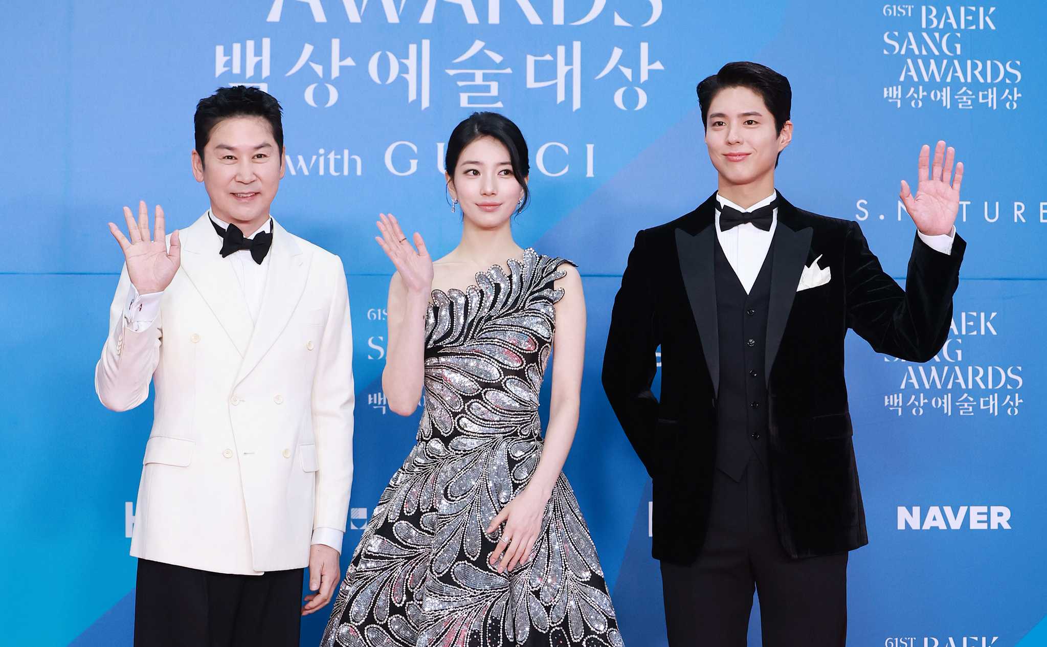 Shin Dong-yeop, Bae Suzy and Park Bo-gum, the hosts for the 61st Baeksang Arts Awards, pose on the red carpet ahead of the 61st Baeksang Arts Awards ceremony held at Coex in Gangnam District, southern Seoul, on May 5. [NEWS1]