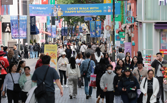 People walk through Myeong-dong in central Seoul on May 6. [YONHAP] 