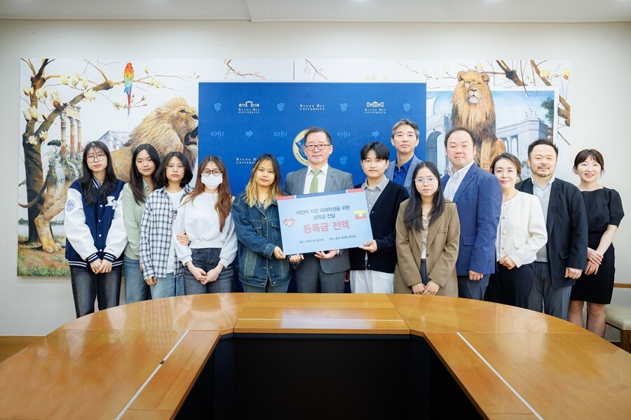 Burmese students receiving full scholarships for the fall 2025 semester pose for a photo with Kyung Hee University officials on April 30. [KYUNG HEE UNIVERSITY]