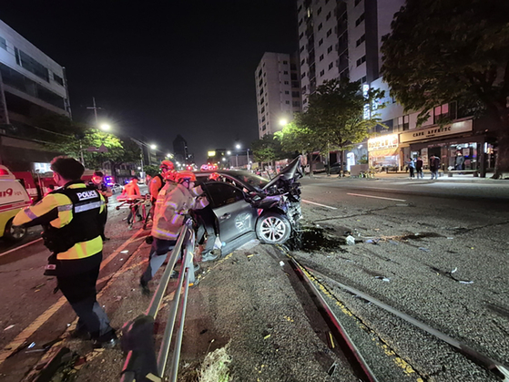 Two cars lie in ruins at a crash site in Incheon on May 8. [INCHEON FIRE SERVICES]