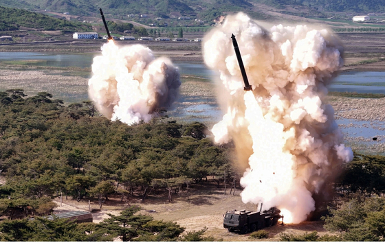 North Korea's 600-millimeter multiple rocket launchers are seen during a drill on May 8. [YONHAP]