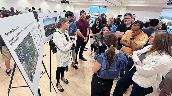 Residents of West Lafayette, Indiana, listen to an explanation about a semiconductor facility on April 24. [DAVE BANGERT]