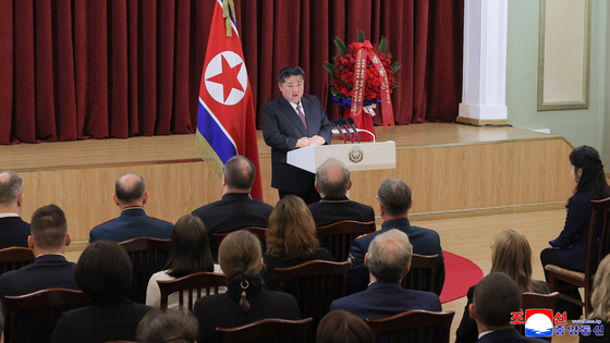 North Korean leader Kim Jong-un, center, delivers a speech during his visit to the Russian Embassy in Pyongyang to mark the 80th anniversary of the Soviet Union's defeat of Nazi Germany in World War II in this photo carried by the North's official Korean Central News Agency on May 10. [YONHAP]