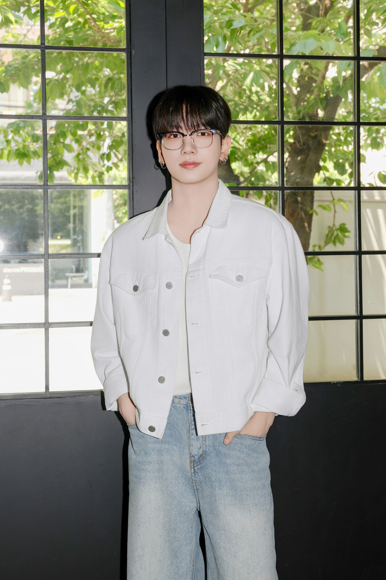 Member Myung Jae-hyun of boy band BoyNextDoor poses for photos prior to an interview with reporters on May 9 in western Seoul. [KOZ ENTERTAINMENT]
