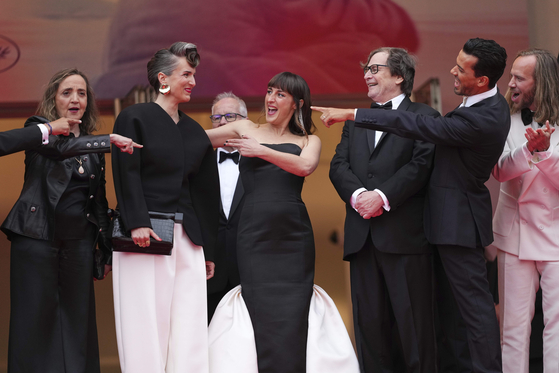 Dominique Blanc, from left, director Amelie Bonnin, Juliette Armanet, Francois Rollin, Tewfik Jallab, and co-writer Dimitri Lucas pose for photographers during the opening ceremony red carpet of the 78th international film festival, Cannes, southern France, May 13. [AP/YONHAP]