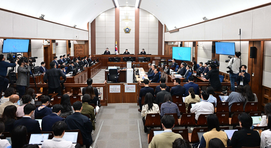 A hearing takes place at the Seoul Central District Court on April 21. [JOINT PRESS CORPS]