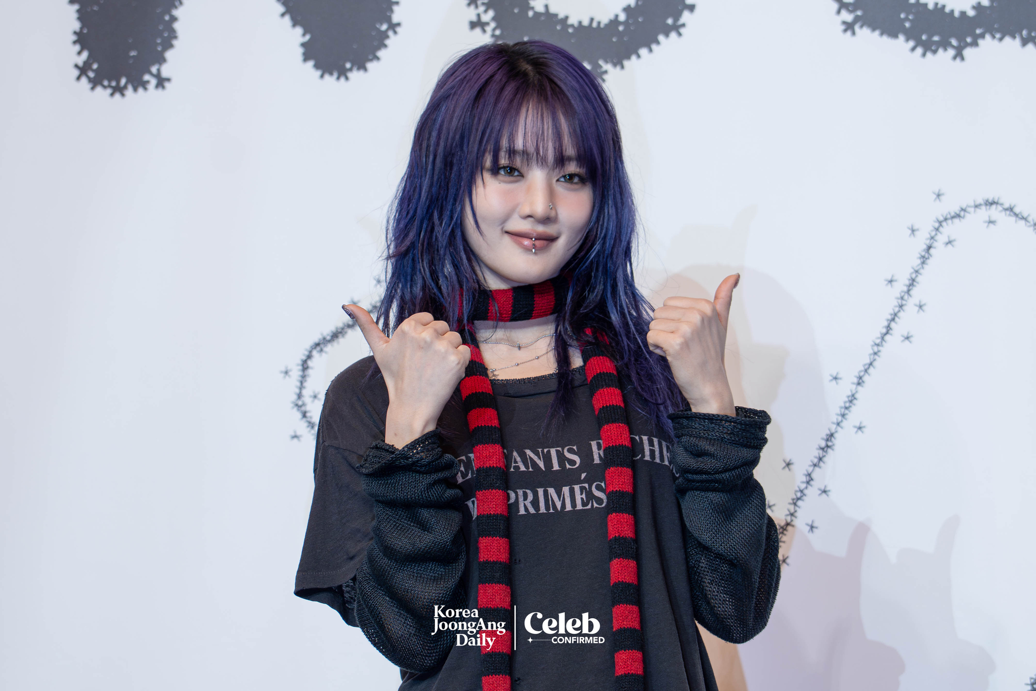 i-dle's Minnie poses for photos during a press conference at the Josun Palace hotel in southern Seoul for the release of its eighth EP, “We are," on May 19. [DANIELA GONZALEZ PEREZ]