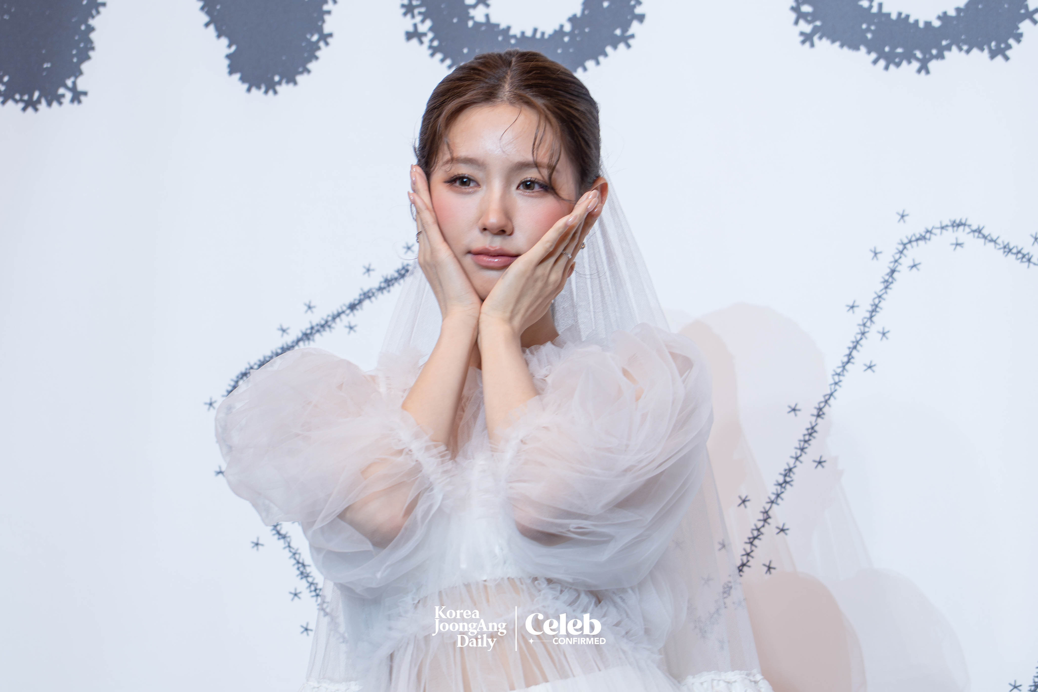 i-dle's Miyeon poses for photos during a press conference at the Josun Palace hotel in southern Seoul for the release of its eighth EP, “We are," on May 19. [DANIELA GONZALEZ PEREZ]