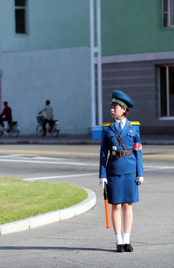 A traffic official stands in Pyongyang, North Korea, on Sept. 18, 2018. [JOINT PRESS CORPS]