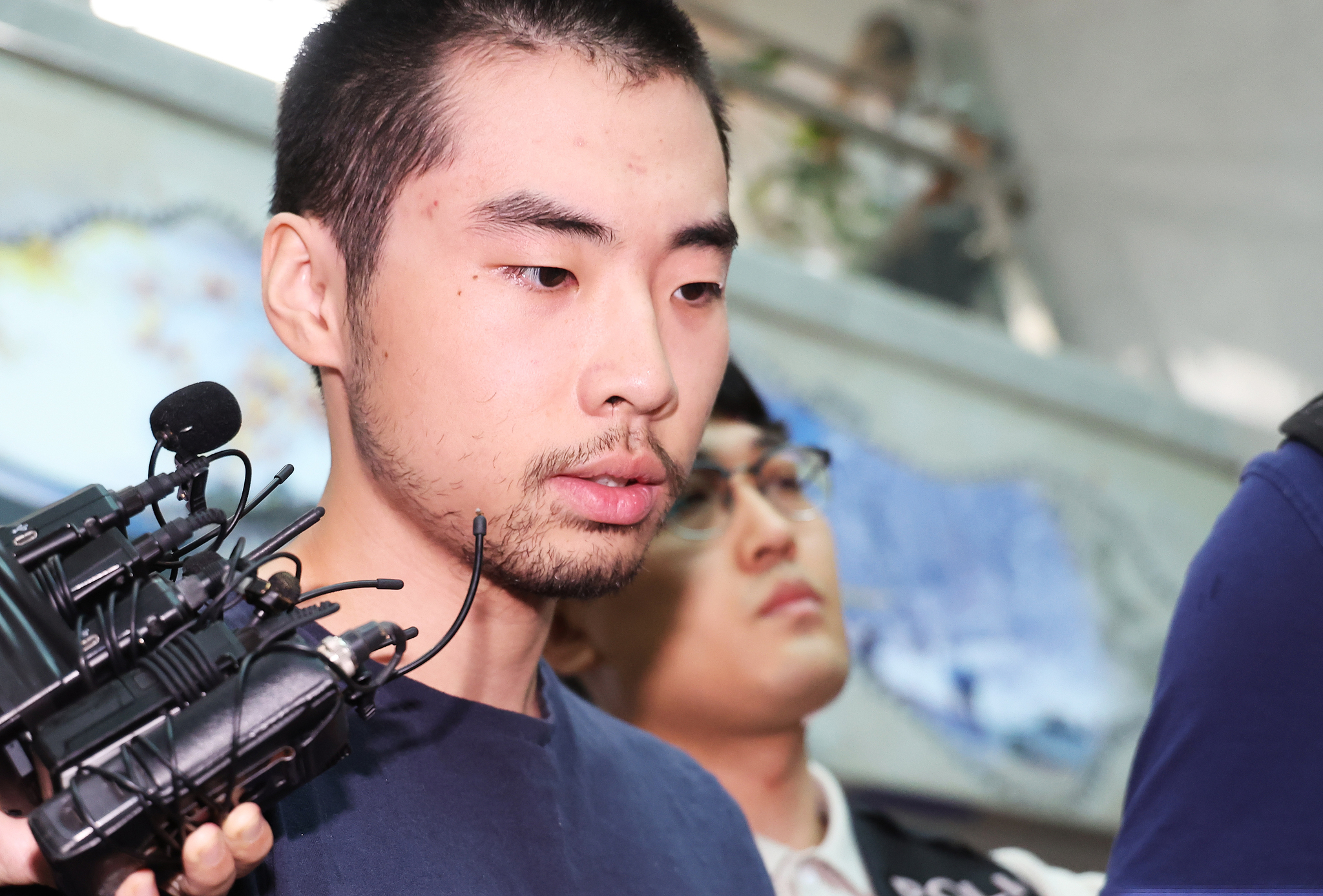 Choi Won-jong, speaks to reporters at a police station in Seongnam in on Aug. 10, 2023, as he is transferred to the prosecution. [YONHAP]