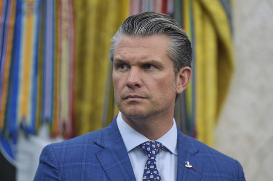 U.S. Defense Secretary Pete Hegseth listens during an event with President Donald Trump to sign executive orders regarding nuclear energy in the Oval Office of the White House in Washington on May 23. [AP/YONHAP]