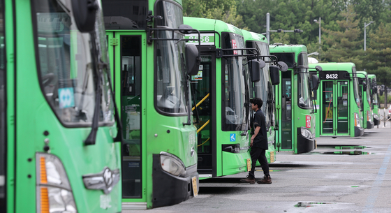 Buses are parked at a village bus depot in Seoul on May 22. [NEWS1] 