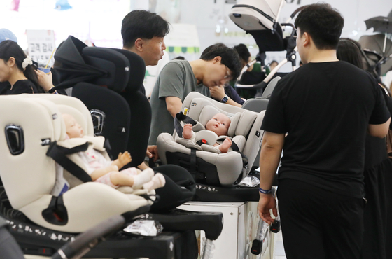 Visitors browse a variety of childcare products at the 2024 Busan Baby Fair & Early Childhood Education Expo held at Bexco in Haeundae District, Busan, on July 18, 2024. [NEWS1] 