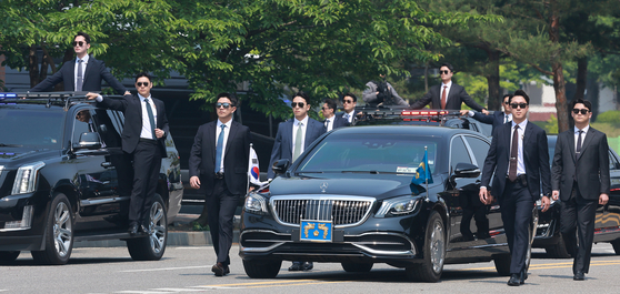 Presidential Security Service agents participate in a security demonstration event at the Presidential Security Training Center in Gangseo District, western Seoul, on May 27. [JOINT PRESS CORPS]