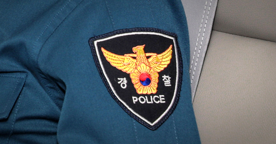 The Korean police's logo as seen on an officer [YONHAP]