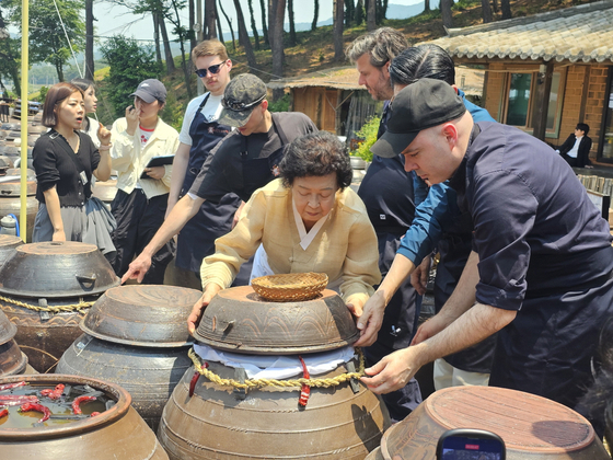 Korea food grand master Ki Soon-do and chefs make jang, or Korean fermented sauce. [SOUTH JEOLLA]