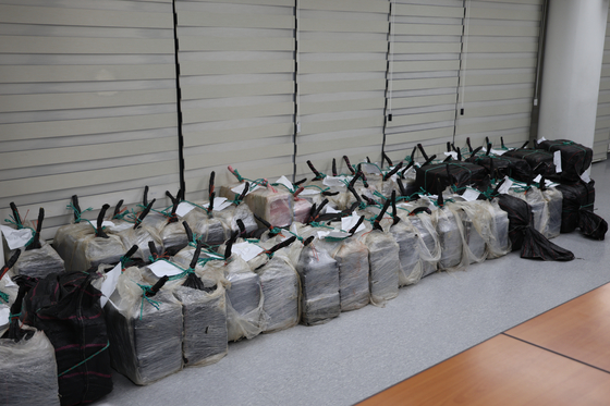 Bundles of cocaine confiscated through a joint operation between the Korea Customs Service and the Coast Guard are seen on April 2. [JOONGANG ILBO]