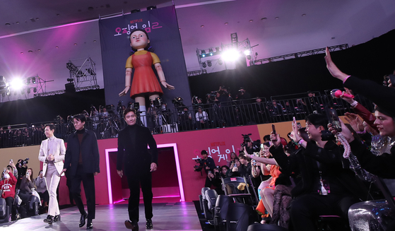 Actor Lee Jeong jae, Director Hwang Dong-hyuk and actor Lee Byung-hun enter a media event for the premiere of the second season of ″Squid Game″ (2021-) in Jung District, central Seoul, on Dec. 9, 2024. [NEWS1] 