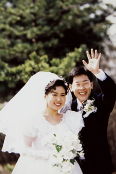 A wedding photo of Lee Jae-myung, right, and Kim Hye-kyung [LEE JAE-MYUNG] 