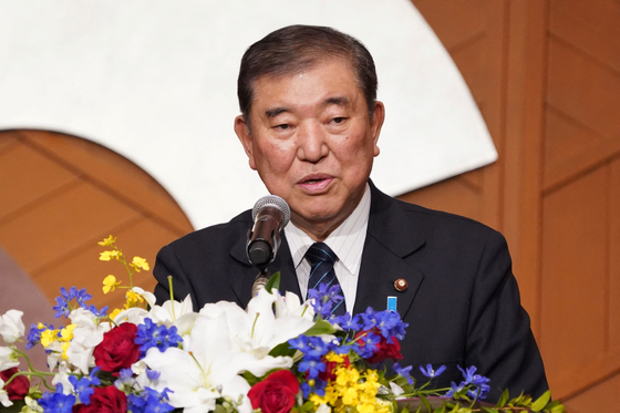 Japan's Prime Minister Shigeru Ishiba delivers a speech at the Japan-Brazil Economic Forum in Tokyo on March 26. [AFP/YONHAP]