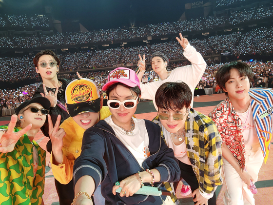 Boy band BTS perform on stage in 2022. [BIGHIT MUSIC]