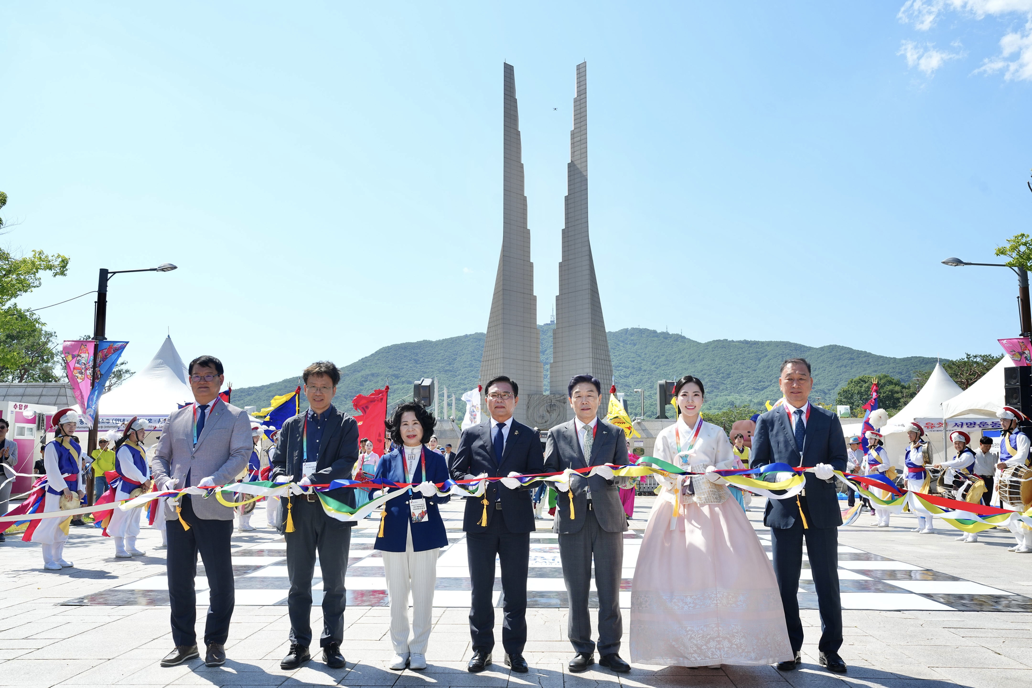 Officials from the Cheonan city government and Cheonan K-Culture Expo 2025 organizing committee pose for photos during an opening ceremony held at the Independence Hall in Cheonan, South Chungcheong, on June 4. [K-CULTURE EXPO ORGANIZING COMMITTEE]
