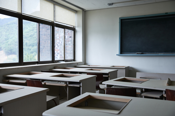 Stock photo of an empty classroom unrelated to the story [GETTY IMAGES BANK]