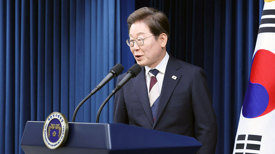 President Lee Jae-myung enters a briefing room at the presidential office in Yongsan, central Seoul, for an appointments announcement on June 4. [JOINT PRESS CORPS]