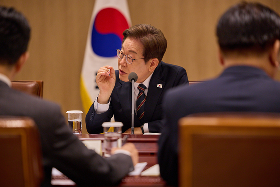 President Lee Jae-myung speaks in an emergency economic task force meeting with officials held at the presidential office in Yongsan District, central Seoul, on June 9.[JOINT PRESS CORPS]