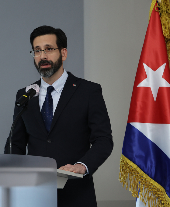 Claudio Raúl Monzón Baeza, the first Cuban ambassador to South Korea, speaks during the opening ceremony of the Cuban Embassy in central Seoul on June 10. [YONHAP] 