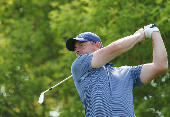 Rory McIlroy watches his ball after a swing during the pro-am at the Canadian Open in Caledon, Canada on June 4. [AP/YONHAP] 