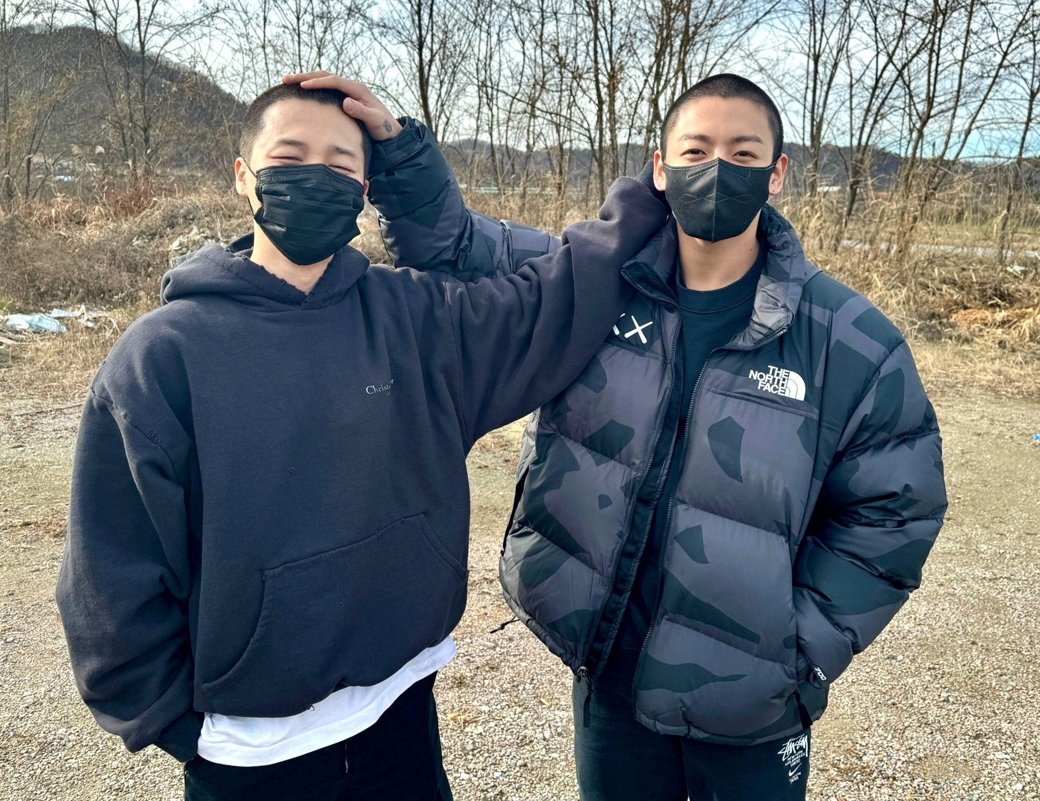 BTS members Jimin, left, and Jungkook pose for the camera on Dec. 12, 2023, the day they began their military service together. [SCREEN CAPTURE/BIGHIT MUSIC]