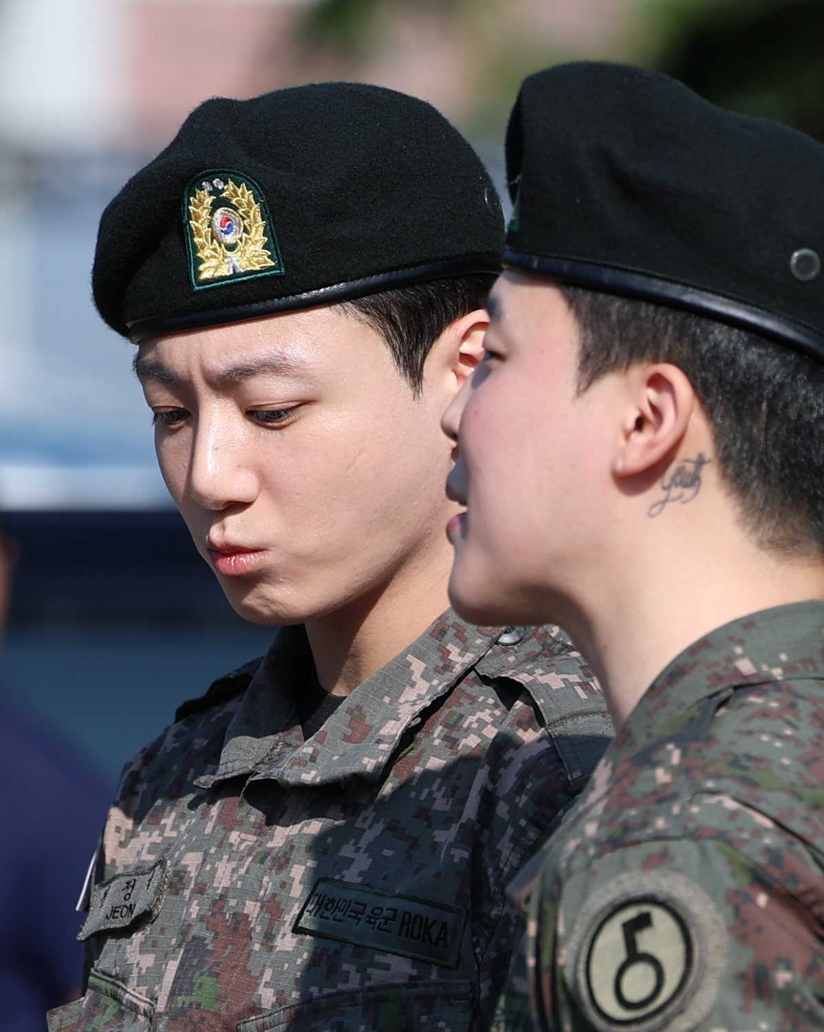 Members Jungkook, left, and Jimin of boy band BTS on June 11 in Yeoncheon, Gyeonggi, after finishing their mandatory military duties [NEWS1]