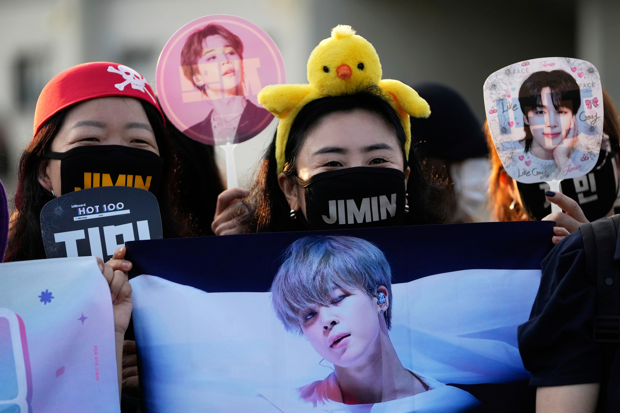 Fans wait for the arrival of K-pop band BTS members Jimin and Jungkook in Yeoncheon, Gyeonggi, on June 11, 2025. [AP/YONHAP]