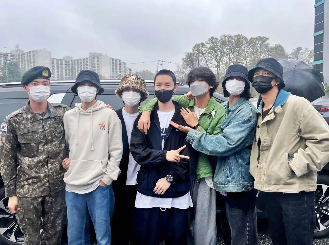 BTS members, who came to support J-Hope, center, for his enlistment, pose together on April 18, 2023, in a photo uploaded on the group's social media account. [BIGHIT MUSIC/SCREEN CAPTURE]