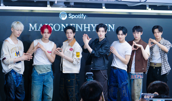 Boy band Enhypen poses for photos during a press event at Maison Enhypen, set inside the Seoul Museum of Art underground bunker in western Seoul on June 7. [DANIELA GONZALEZ PEREZ]