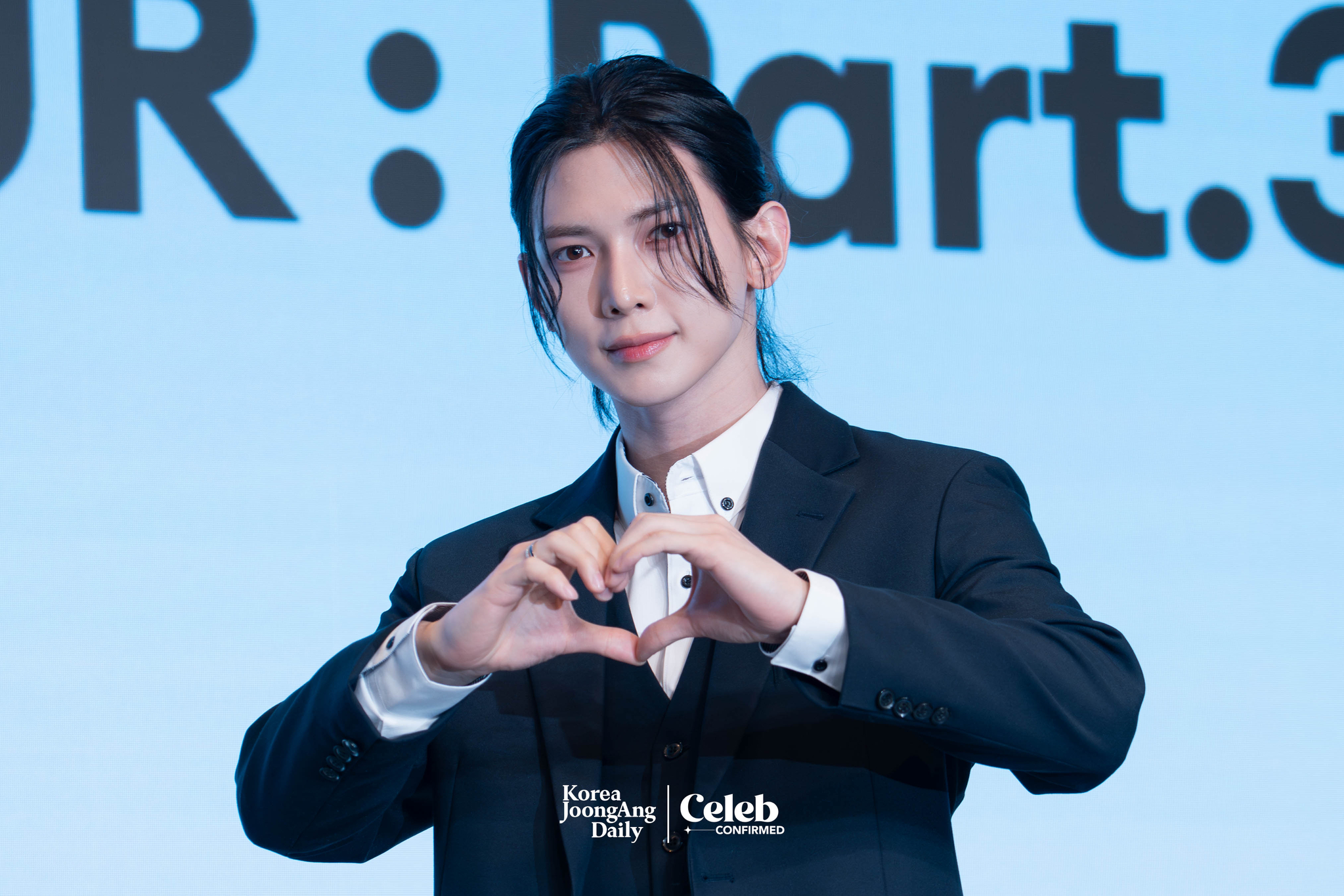 Ateez’s Yeosang poses for photos during a news conference for the release of its 12th EP, “Golden Hour: Part.3,” at Hotel Naru Seoul MGallery Ambassador in western Seoul. [DANIELA GONZALEZ PEREZ]