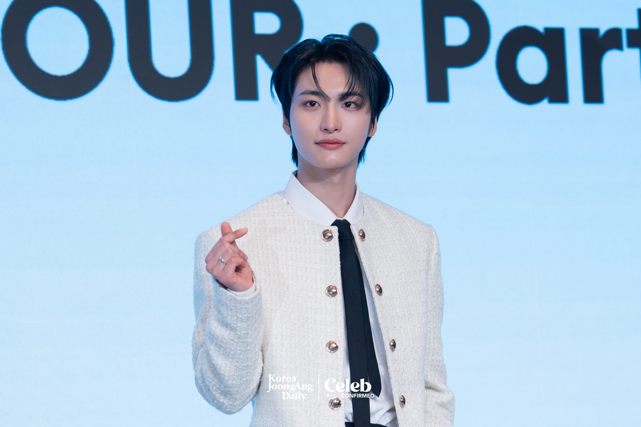 Ateez’s Seonghwa poses for photos during a news conference for the release of its 12th EP, “Golden Hour: Part.3,” at Hotel Naru Seoul MGallery Ambassador in western Seoul. [DANIELA GONZALEZ PEREZ]