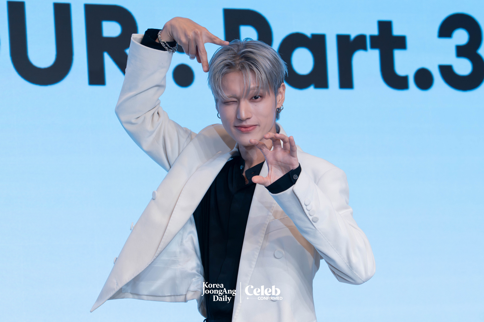 Ateez’s Wooyoung poses for photos during a news conference for the release of its 12th EP, “Golden Hour: Part.3,” at Hotel Naru Seoul MGallery Ambassador in western Seoul. [DANIELA GONZALEZ PEREZ]